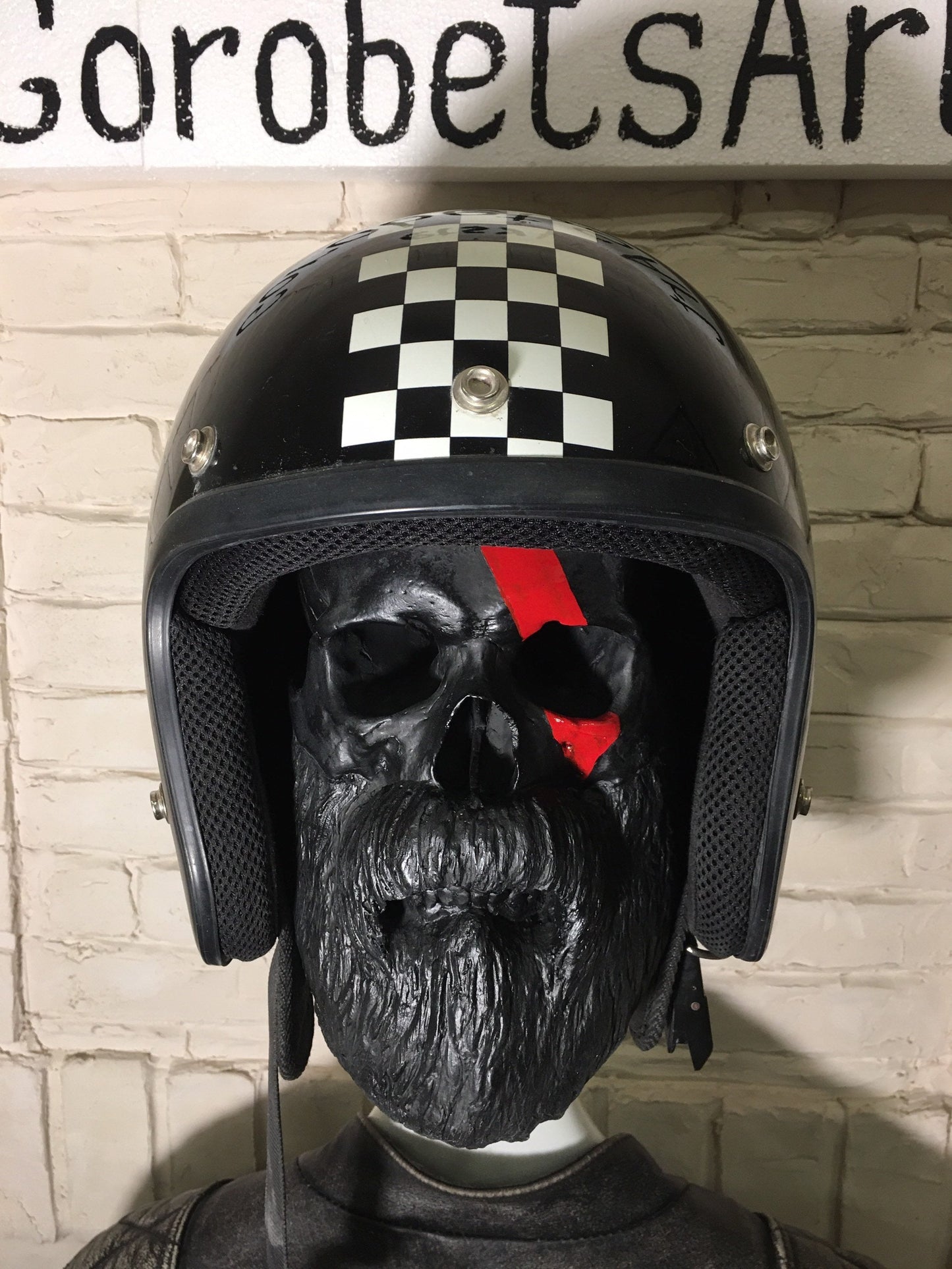 Skull mask motorcycle rider equipped with goggles